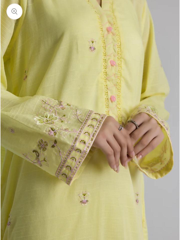 Embroidered lawn dress on Instagram